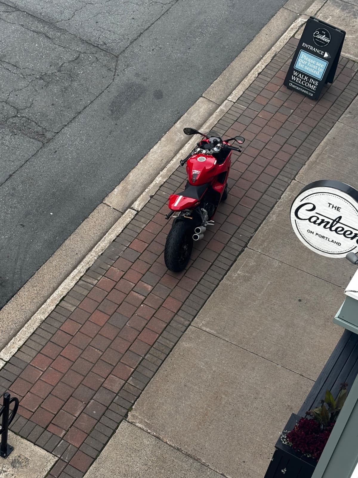 Motorcycle parked on sidewalk illegally